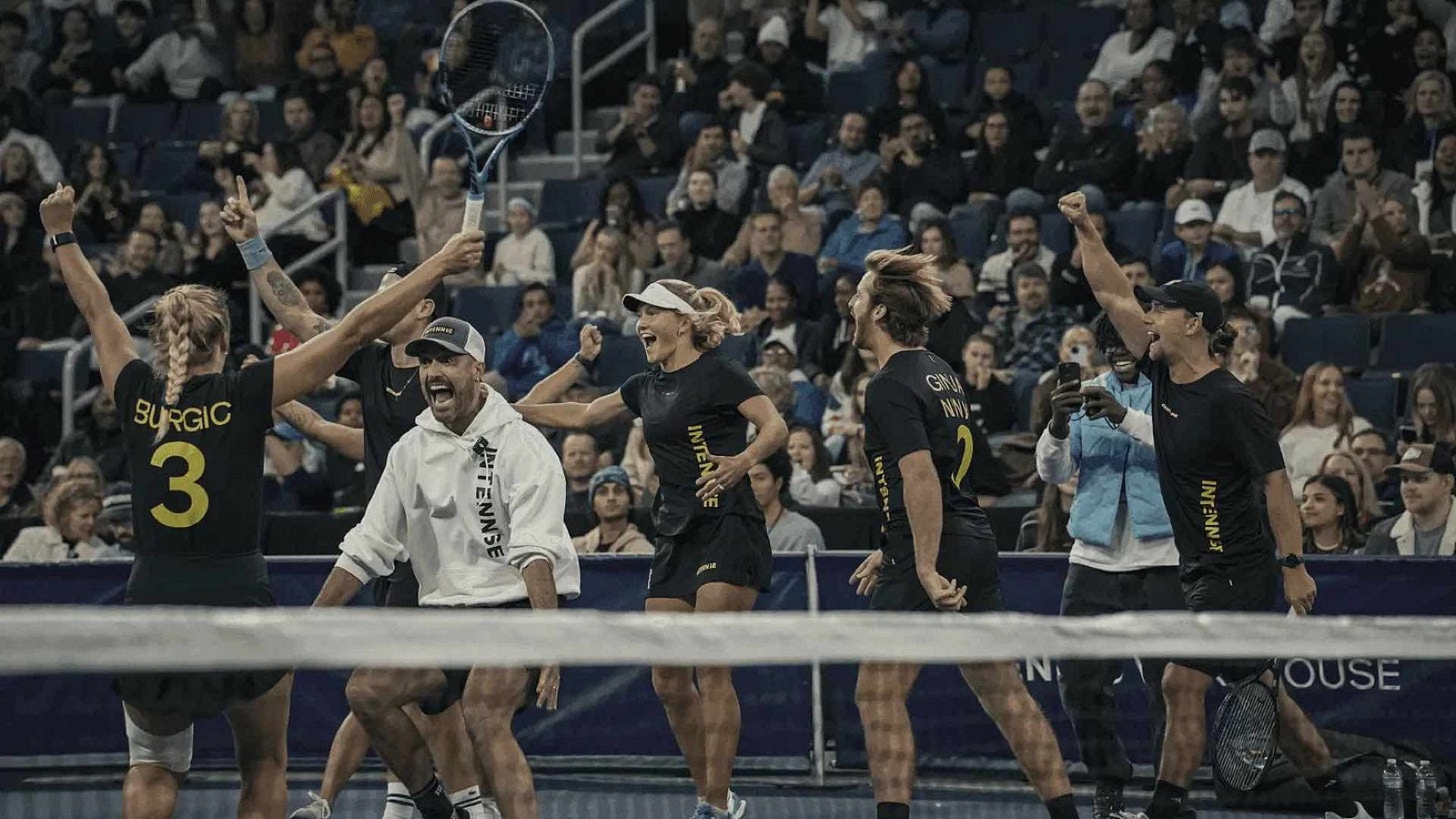 Players on court at an INTENNSE community event